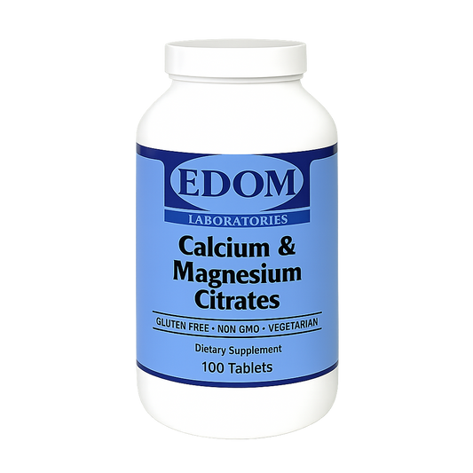 A white plastic bottle of EDOM LABORATORIES Calcium & Magnesium Citrates dietary supplement containing 100 tablets. The label is deep blue with white and black text showing “Calcium & Magnesium Citrates,” “GLUTEN FREE • NON GMO • VEGETARIAN,” and “Dietary Supplement